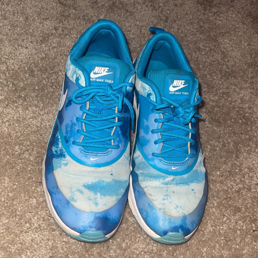 Blue Nike running shoes. Women’s size 10. $35